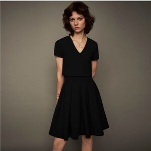 Maje Rozane Black V-Neck Dress
New with tags
Size 2 / US size M
Pleated skirt